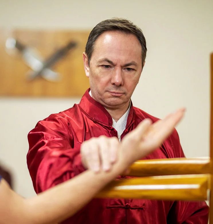 Sifu Wayne Teaching Wing Chun Dummy